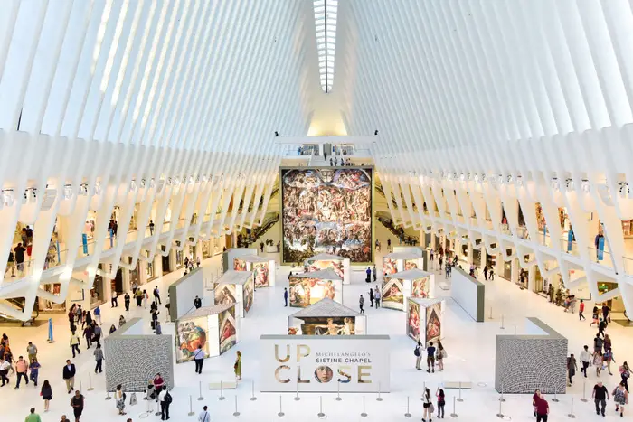 Replicas of Michelangelo's Sistine Chapel Frescoes are displayed inside of the Oculus at the World Trade Center Transportation Hub, June 2017<br>